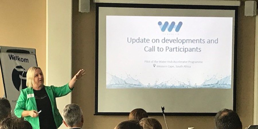Photo of Nichi Walker, Deputy Consul-General of the Kingdom of the Netherlands in Cape Town, introducing the Water Hub.