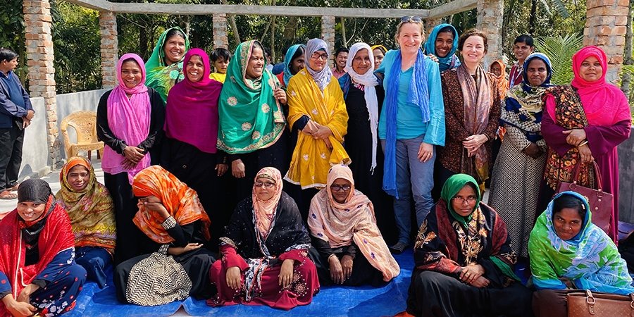 Photo of Joke Le Poole in Bangladesh with a group of Health Promotion Agents (entrepreneurs providing WASH awareness and selling WASH products in their communities).