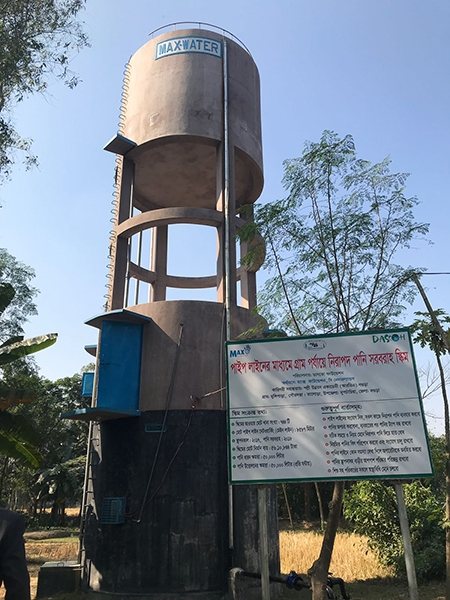 Photo of a Max TapWater water tower at one of the existing piped water schemes in Bangladesh.