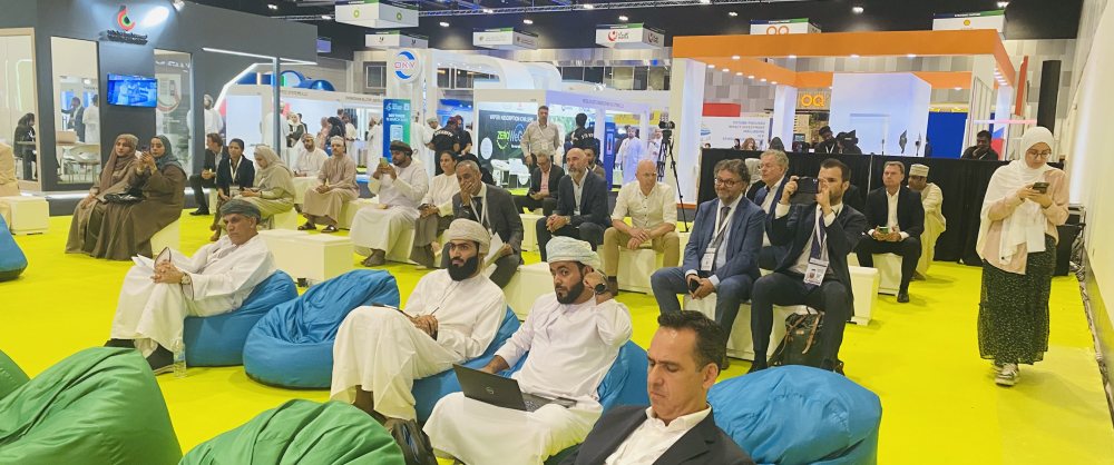 Attendees listening to pitch presentations of Dutch companies at Sustainability Talks theatre at Oman Sustainability Week 2023