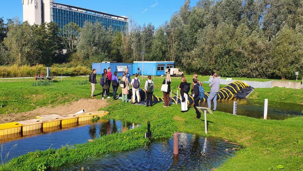 A group of delegates from the Netherlands Enterprise Agency (RVO) attending a demonstration at Flood Proof Holland TU Delft Campus as part of the 'A Day in the Life of' support programme.