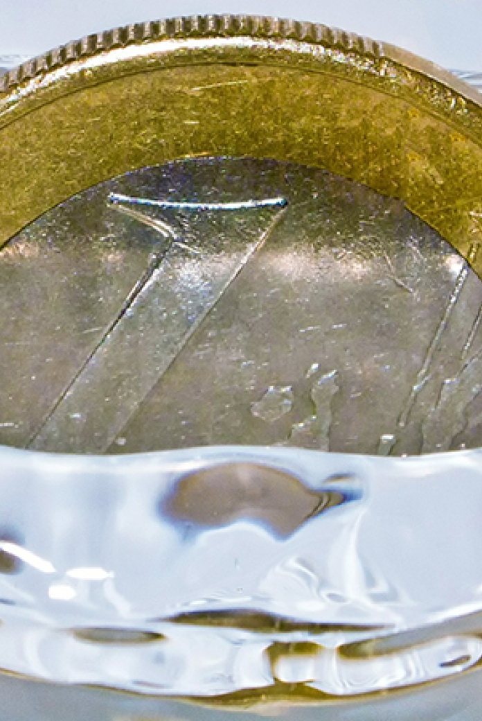Photo of a coin in the water