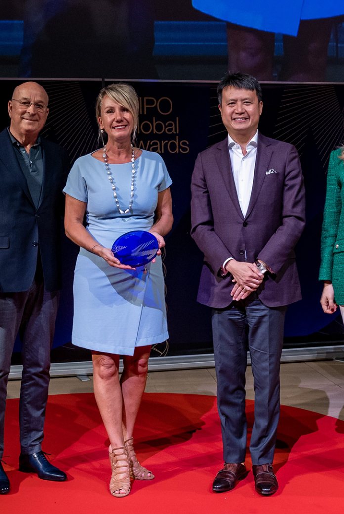 Photo of Sabine Stuiver, Chief Marketing Officer and Co-founder of Hydraloop, holding the UN WIPO Global Award.