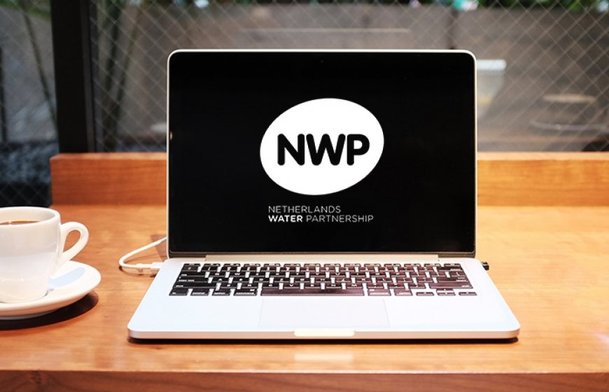 Photo of a laptop with NWP logo