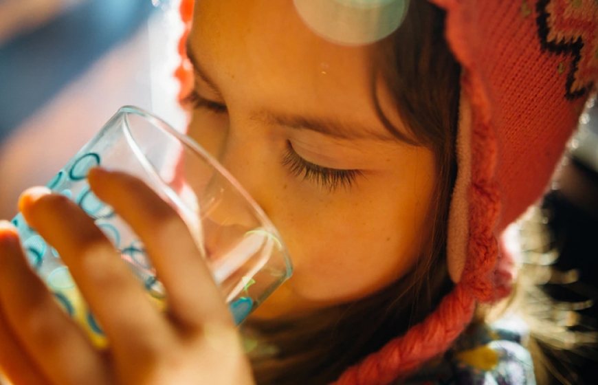 Photo of a girl drinking water
