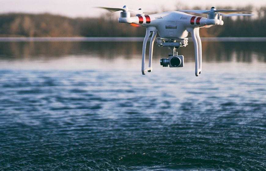Photo of a drone recording information about water.