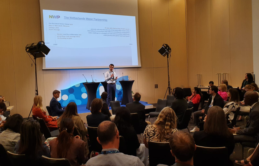About 50 conference visitors in a conference room listen to the presentation of Rick Elmendorp of NWP at the NoWNET meeting at Stockholm World Water Week 2024