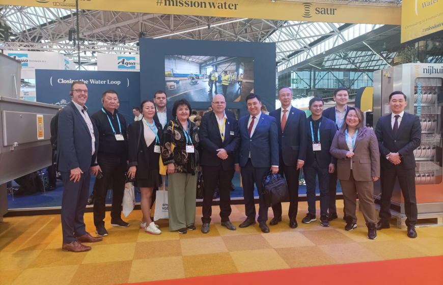 Group of people from Kazakhstan visiting the Nijhuis stand at Aquatech Amsterdam 2025 trade fair